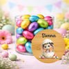 Jar of colorful Easter eggs with a personalized wooden coaster featuring a bunny design and name 'Sienna'.
